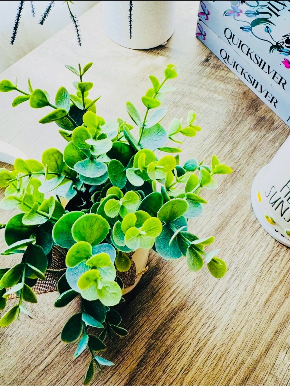 Green Faux Eucalyptus Arrangement in Cream Pot